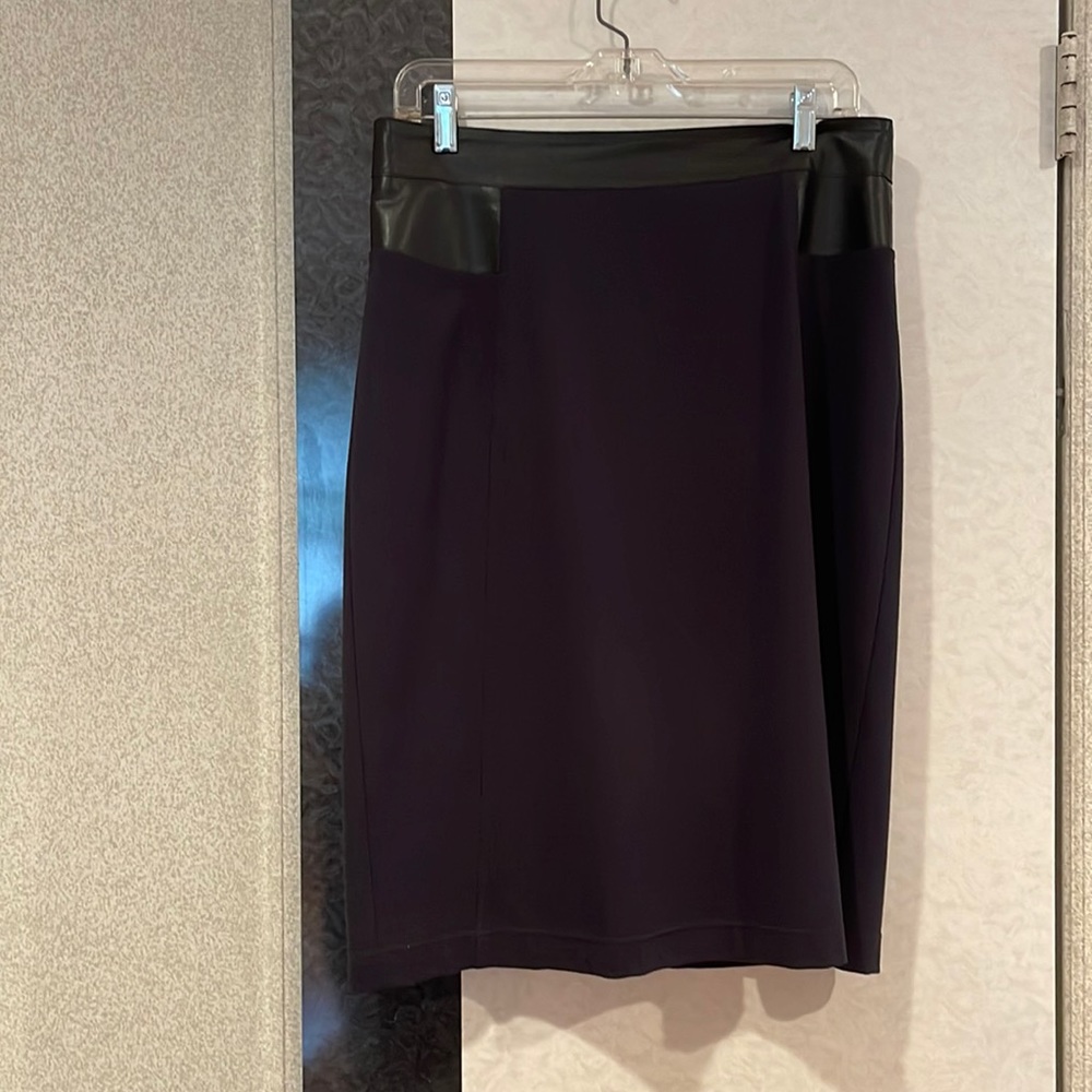 Woman’s skirt , dark navy blue with black artificial leather waist  band